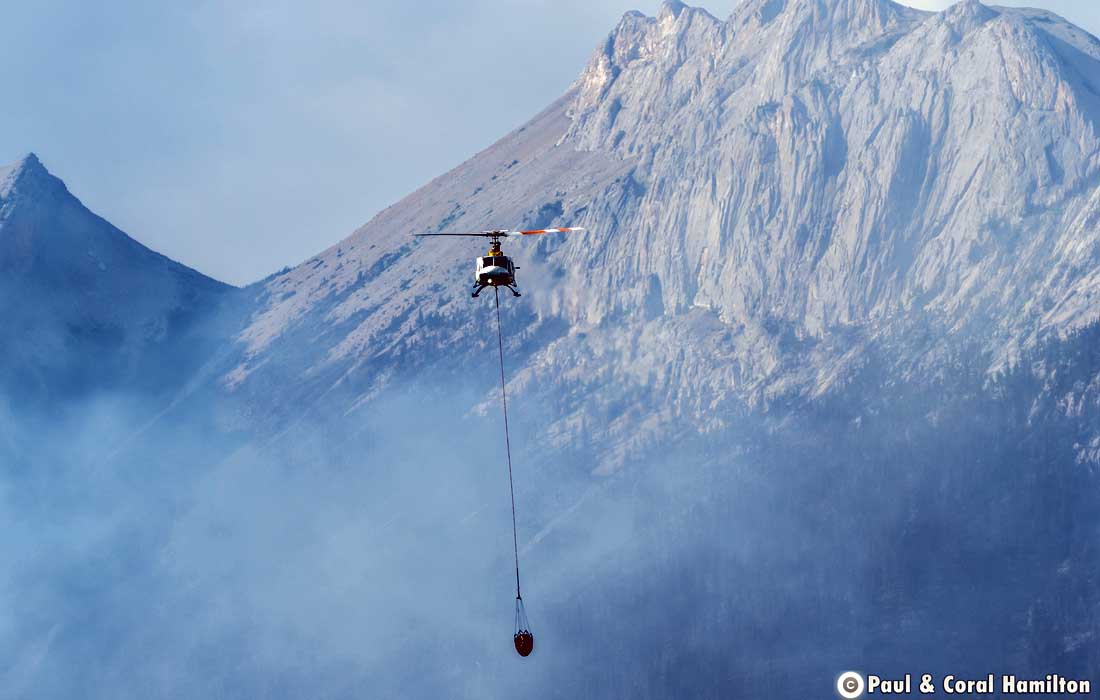 Provincial airtankers have been re-assessing the Chetamon wildfire Friday